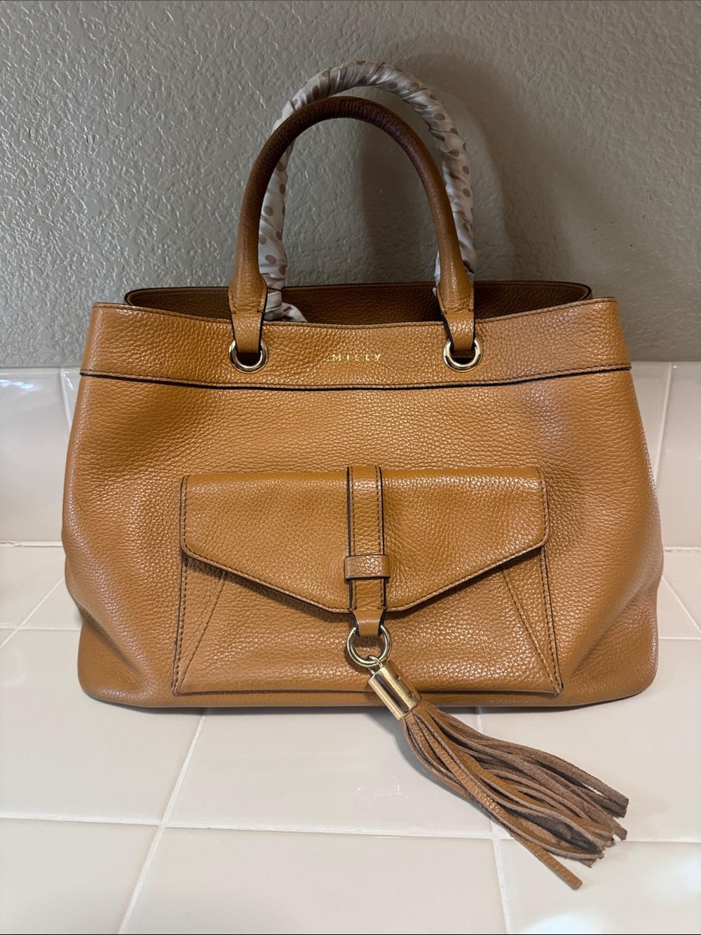 Milly Caramel Brown Pebbled Leather Satchel with Tassel.